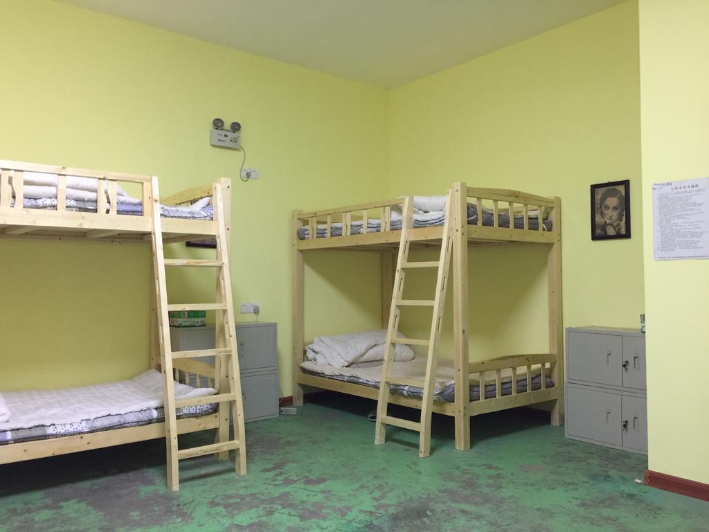Pingyao Agam International Youth Hostel Номер фото